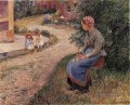 une servante assise dans le jardin d’eragny 1884 Camille Pissarro